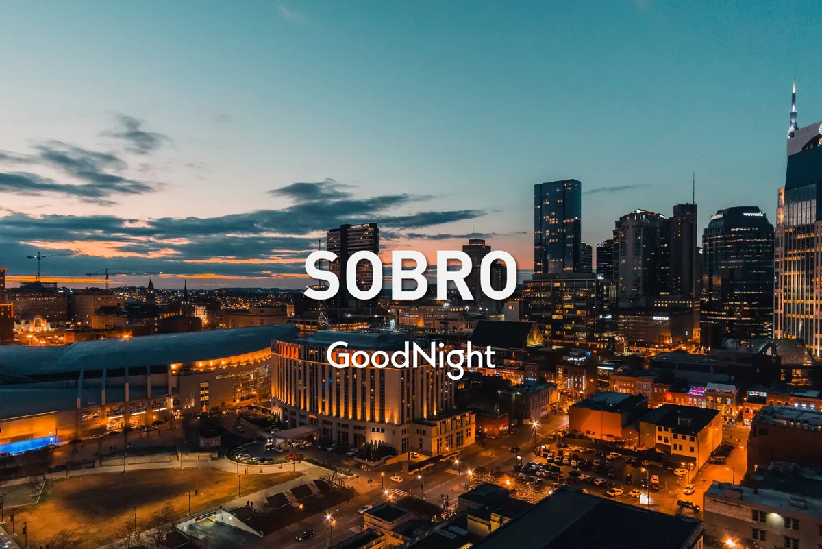 This image presents the Nashville city skyline at dusk, with street lights starting to glow and a serene yet vibrant ambiance. The view captures the pulse of the city as evening activities like strolls, dining, and nightlife begin.