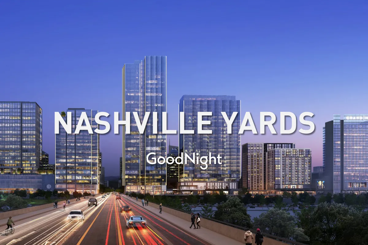 A lively urban exterior showing high-rise buildings and a busy roadway, conveying the energetic vibe of the city and the accessibility of restaurants, entertainment, and nightlife.